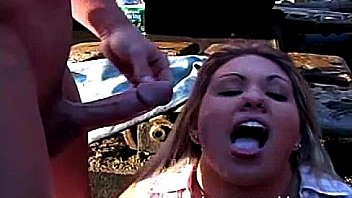 Horny honey shares two cocks outdoors Horny honey shares two cocks outdoors