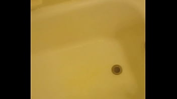 Urinating unto the bathtub Urinating unto the bathtub