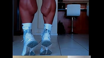 Muscular legs of female bodybuilder Muscular legs of female bodybuilder