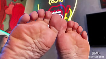 Wiggling toes on the table in front of your face Wiggling toes on the table in front of your face
