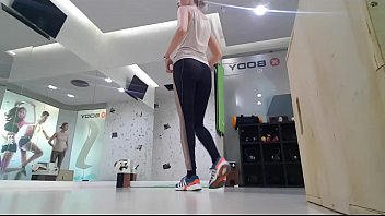 Blonde girl warming up before workout Blonde girl warming up before workout