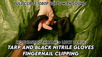 Tarp and black nitrile gloves fingernail clipping Tarp and black nitrile gloves fingernail clipping