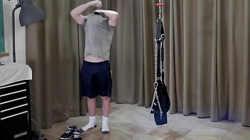 A straight boy is put in a sling and spanked hard A straight boy is put in a sling and spanked hard
