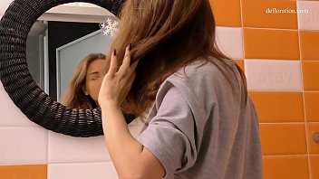 Teen babe showers naked and horny