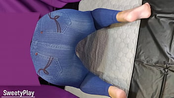 Big ass in jeans pissing with vibrator