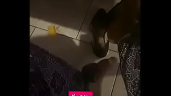 Foot fetish in black casual slippers