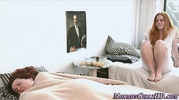 Busty mormon les takes off garment before licking pussy in hd