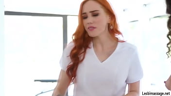 Tall redhead shows her talent in massage to her co that they get horny and start kissing and licking each others pussy