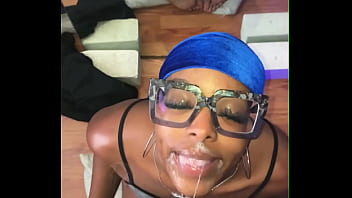 Pretty face slim ebony slut with glasses showing ass toes and soles in the mirror while deep-throating bbc sloppy for a facial and throatpie