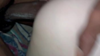 Her ass wasn’t ready for his thick cock—way too big to fit without effort she gasps and squirms as he pushes deeper stretching her out while wife’s at sleep