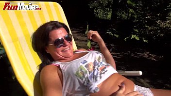 mature masterbating in garden