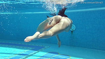 girl straddled pool jet