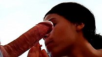 Cute black girl blows a white cock