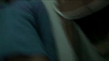 Jade on the ground behind the door with a visitor at home