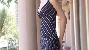 Young beauty flashing her pussy outside