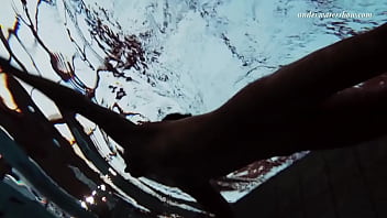 Swimming pool erotics in cute fishnets Swimming pool erotics in cute fishnets