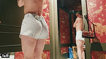 Risky sex in the fitting room with a sales assistant