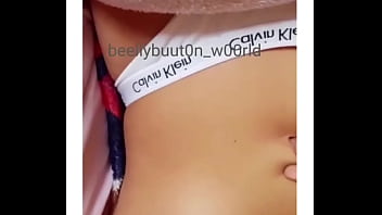 The first video playing with her belly button