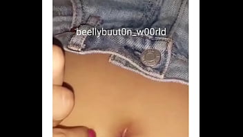 The first video playing with her belly button