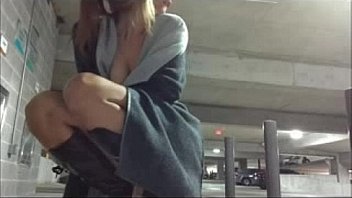 Blonde camgirl masturbates in a parking lot