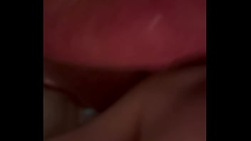 Sucking his dick while he fists me