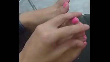 Massaging girls feet