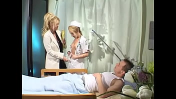 Two naughty bitches share patient's cock on doctor's exam table Two naughty bitches share patient's cock on doctor's exam table