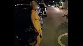 Naked blonde walking down the street
