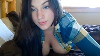 Cute blue eyed brunette showing her tits