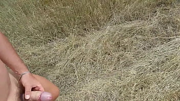 Handsome man is walking naked on the public park