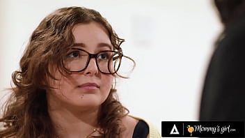 Horny milf is caught wearing a strap on