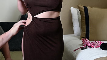 Kat dressing and undressing trying on multiple outfits