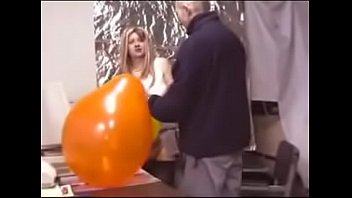 Sex in the office whit a ballon Sex in the office whit a ballon