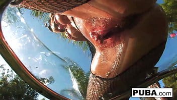 Hot tattooed babe shows her wet pussy