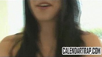 Small tit brunette fingers her tan pussy