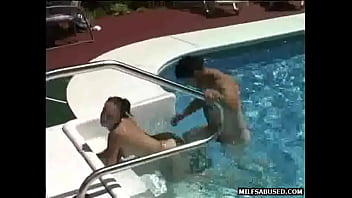 Brunette milf babe gets fucked by a pool before 69ing