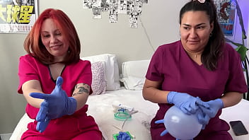 Hot nurses in scrubs mess around with gloves