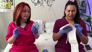 Hot nurses in scrubs mess around with gloves