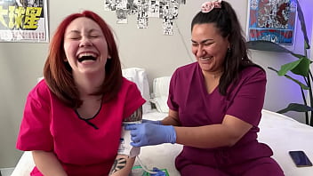 Hot nurses in scrubs mess around with gloves