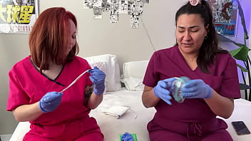 Hot nurses in scrubs mess around with gloves