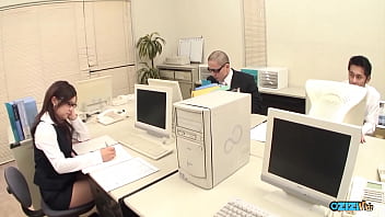 An office environment is an ideal atmosphere for a group of men to appreciate a colleague