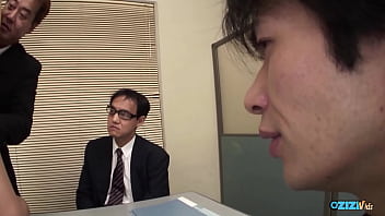 An office environment is an ideal atmosphere for a group of men to appreciate a colleague