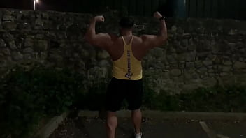 Muscle flexing after gym in the carpark