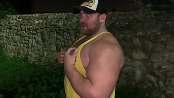 Muscle flexing after gym in the carpark