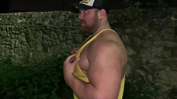 Muscle flexing after gym in the carpark