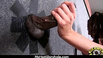 Ebony hottie milking cocks in the gloryhole 15