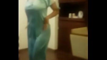 Indian wife dancing in hotel room