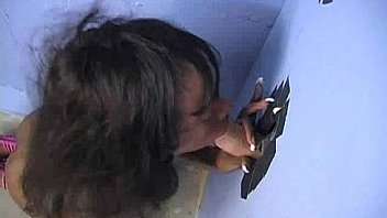 Ebony hottie milking cocks in the gloryhole 30