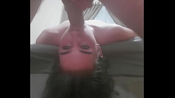 Fucking a whore's throat while she is lying upside down Fucking a whore's throat while she is lying upside down