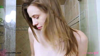 Gorgeous brunette model enjoys a sensual bath